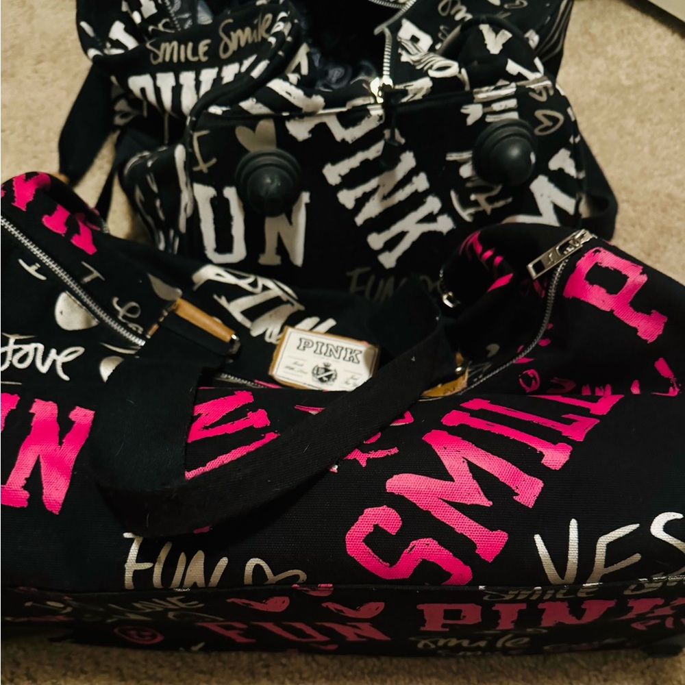 Victorias Secret travel luggage set.